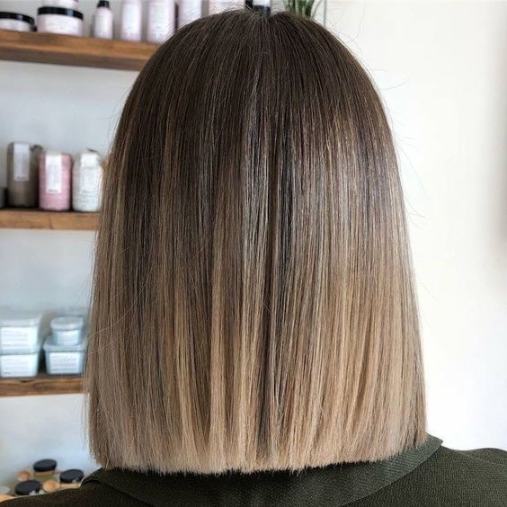 a blunt light brunette long bob with a blonde ombre touch is a stylish and chic idea that looks delicate