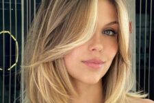 a light brunette long bob with blonde highlights and a money piece is a lovely idea for a fresh and edgy look