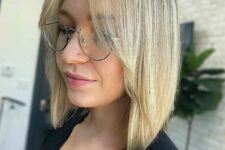 a lovely blonde lob with curtain bangs is a fresh and cool idea for any hair type