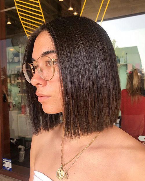 a stylish dark brunette blunt bob with middle part is always a good idea, choose the length that compliments you