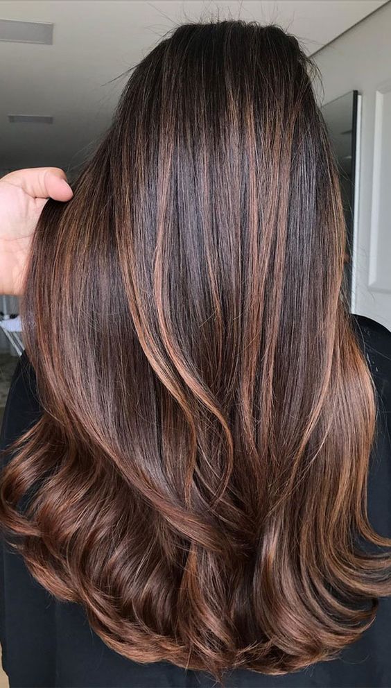 extra long and gorgeous dark hair with chestnut balayage, waves and volume, is a fantastic idea to rock