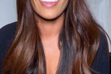 extra long and shiny chestnut hair with a bit of waves is a stunning idea to rock, it looks absolutely gorgeous