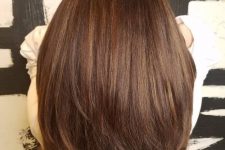 extra long and volumetric chestnut hair with layers is a gorgeous solution that will catch all the eyes