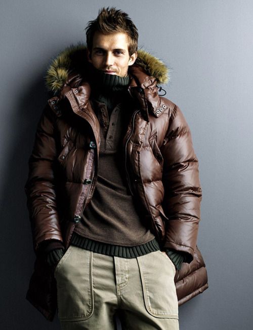 beige pants, a brown sweater, a brown quilted parke coat