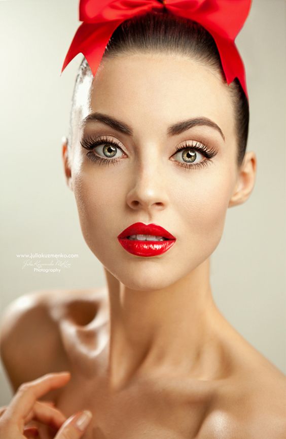 a classic red lip look with light smokey eyes