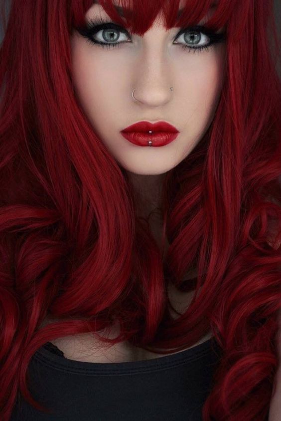 gorgeous bold red hair with a fringe