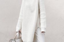 06 a white oversized turtleneck sweater and pants, a white bag