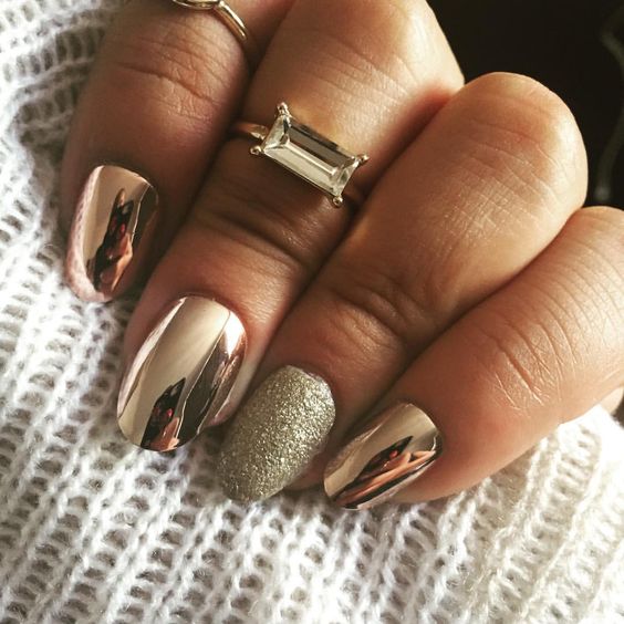 copper metallic nails with a silver glitter accent nail