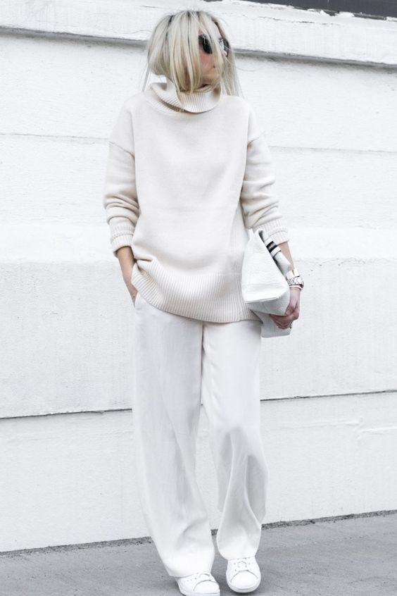 an oversized white turtleneck sweater and pants to feel comfy
