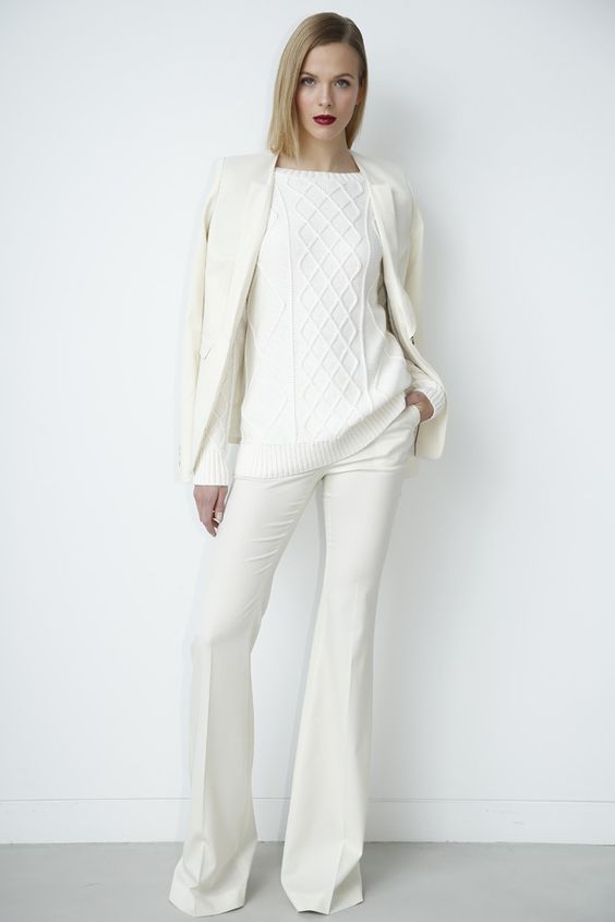white pants and a sweater, an ivory jacket