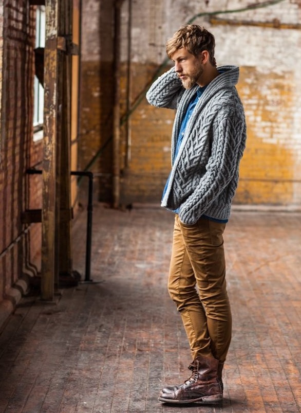 ocher pants, a cable knit cardigan and brown boots