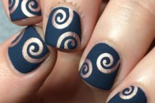 23 matte navy nails with metallic copper swirls
