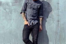 With denim shirt and dark color jeans