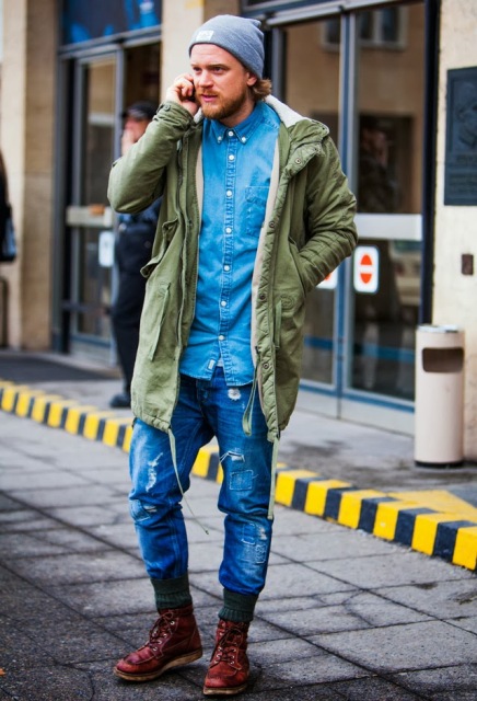 With denim shirt, distressed jeans and marsala boots