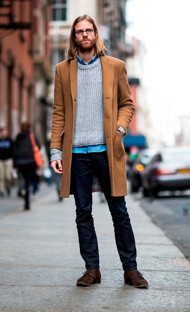 With denim shirt, gray sweater, navy blue trousers and brown shoes