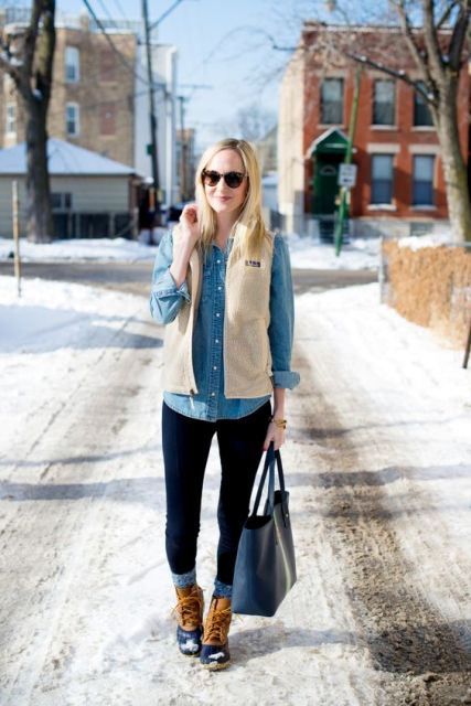 With denim shirt, vest, jeans and tote