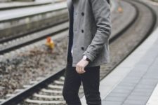 With gray jacket and black pants