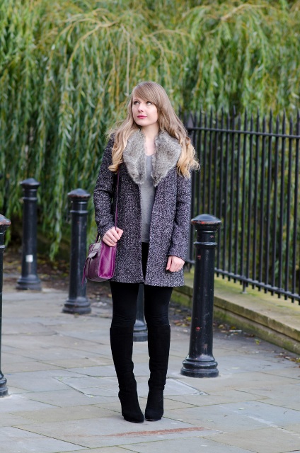 With gray shirt, black skinnies, suede boots and purple bag