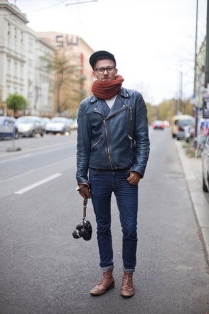 With leather jacket, jeans and knitted scarf