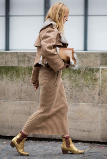 With midi skirt, shearling jacket and clutch