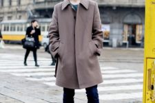 With neutral color coat and jeans