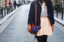 With pastel color skirt, jacket, brown bag and black tights