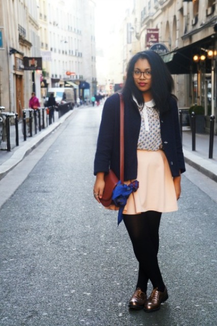 With pastel color skirt, jacket, brown bag and black tights