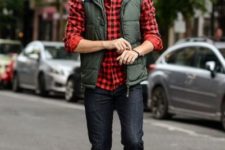 With plaid shirt, cuffed jeans and brown boots