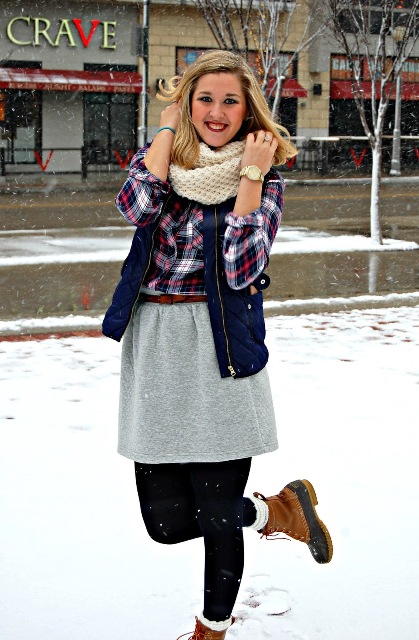 With plaid shirt, puffer vest, knitted scarf and gray skirt