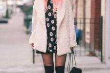 With printed mini dress, platform boots and mini backpack