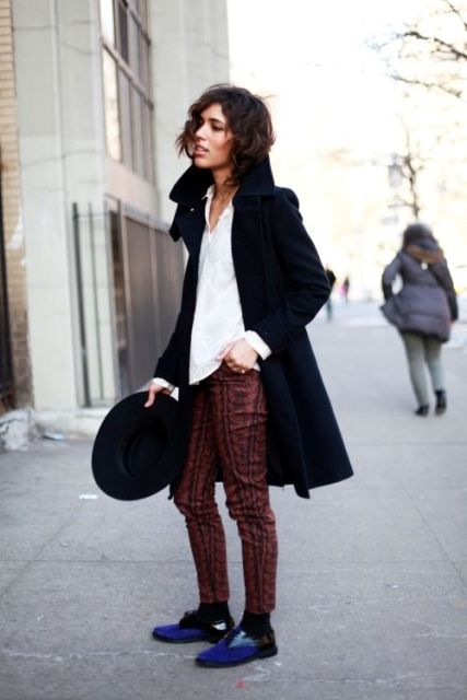 With printed pants, white shirt, black coat and hat