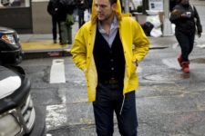 With shirt, black blazer, yellow coat and jeans