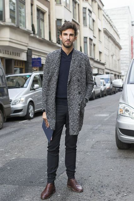 With shirt, black trousers and tweed coat