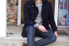 With striped shirt, cuffed jeans and brown shoes