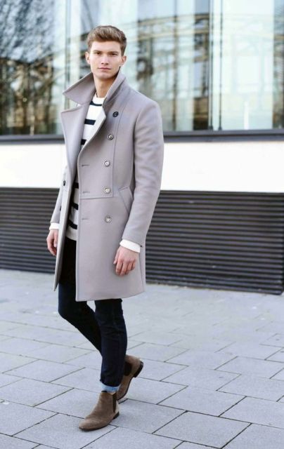 With striped shirt, cuffed jeans and pastel color coat