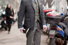 With tweed jacket, light gray vest and trousers