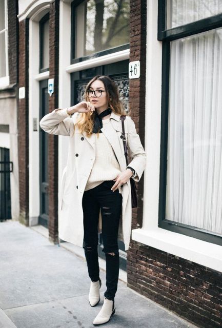With white sweater, coat and distressed black jeans