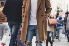 With white t-shirt, distressed jeans and beige suede boots
