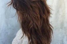 messy layers on ombre dark hair look chic