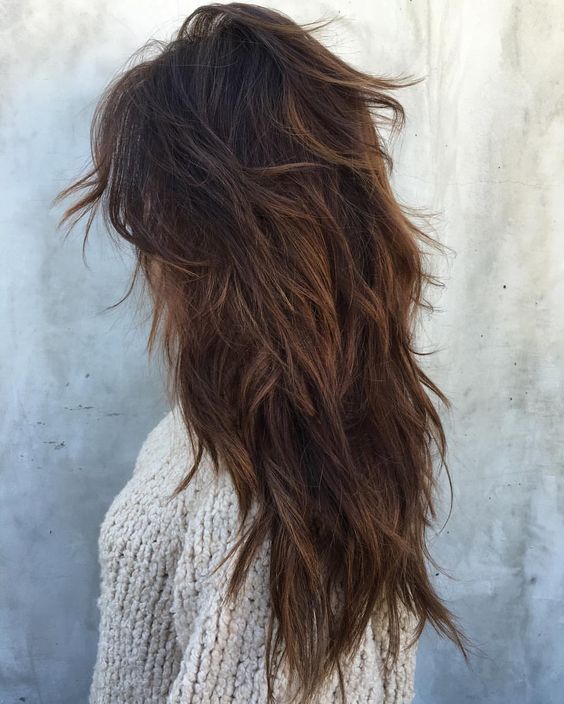 messy layers on ombre dark hair look chic