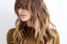 off-center bangs, long layers and pretty, loose waves