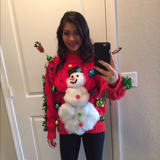 fluffy snowman sweater with ornaments attached