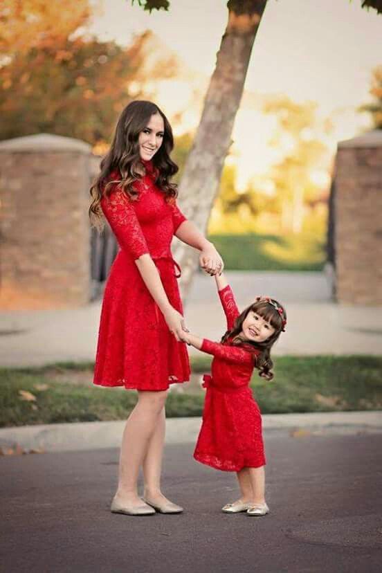 red lace dresses and neutral flats for both