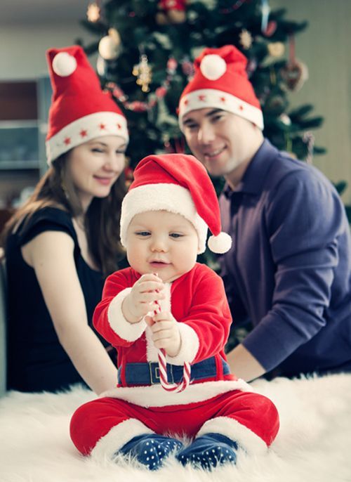 Santa hats for parents and a Santa costume for the child