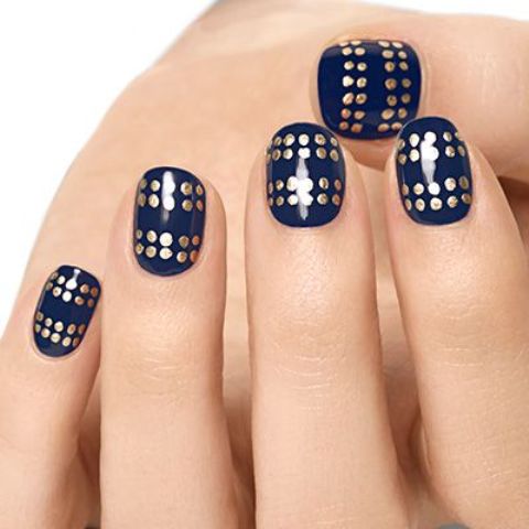 navy nails with gold polka dots made with a sharpie