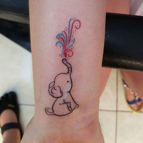 Awesome baby elephant tattoo design