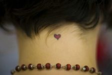 Back neck heart tattoo