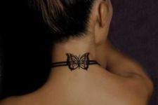 Black-contour butterfly on the neck