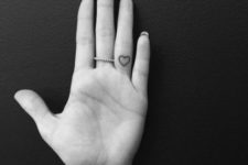 Black-contour heart tattoo