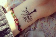 Black tree tattoo